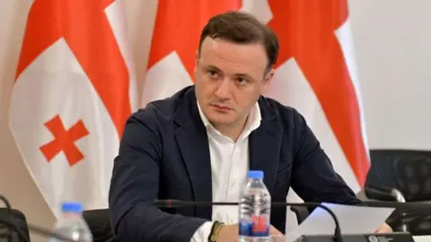 ირაკლი ზარქუა გიორგი ჩუბინიძეზე: გერმანიაში იმალება და იქიდან მავნებლობს ეს ქალაჩუნა რადიკალი, ჩემზე მორიგი სიყალბე და აბსურდული განცხადება გაუვრცელებია!