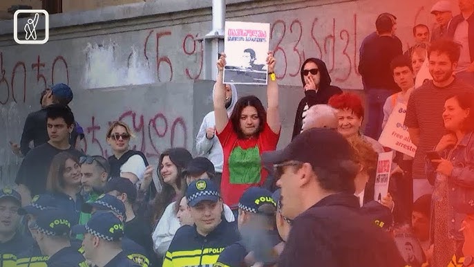 მსვლელობის მონაწილეთა ნაწილი პოლიტპატიმართა ოჯახებს დაუპირისპირდა (ვიდეო)