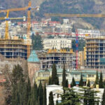 What drives prices in the real estate market?