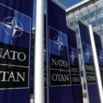 How much do NATO countries spend in military, health and education?