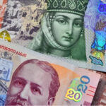 The GEL rate, with respect to the dollar and the euro