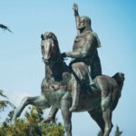 Levan Gambashidze: Erekle did not deserve the second such monument. He did not deserve his cult to be granted to the sellers of the country… Как, удручен венцом, Такой-то царь, в такой-То народ,